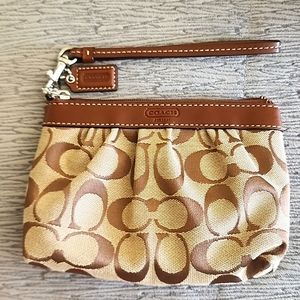 Signature Coach cloth & leather wristlet